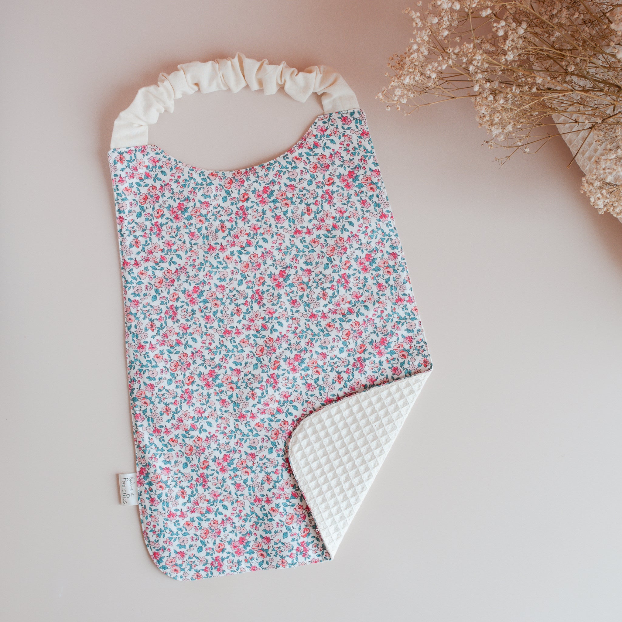 Bavoir-serviette élastiqué Tim - motif Rosalie